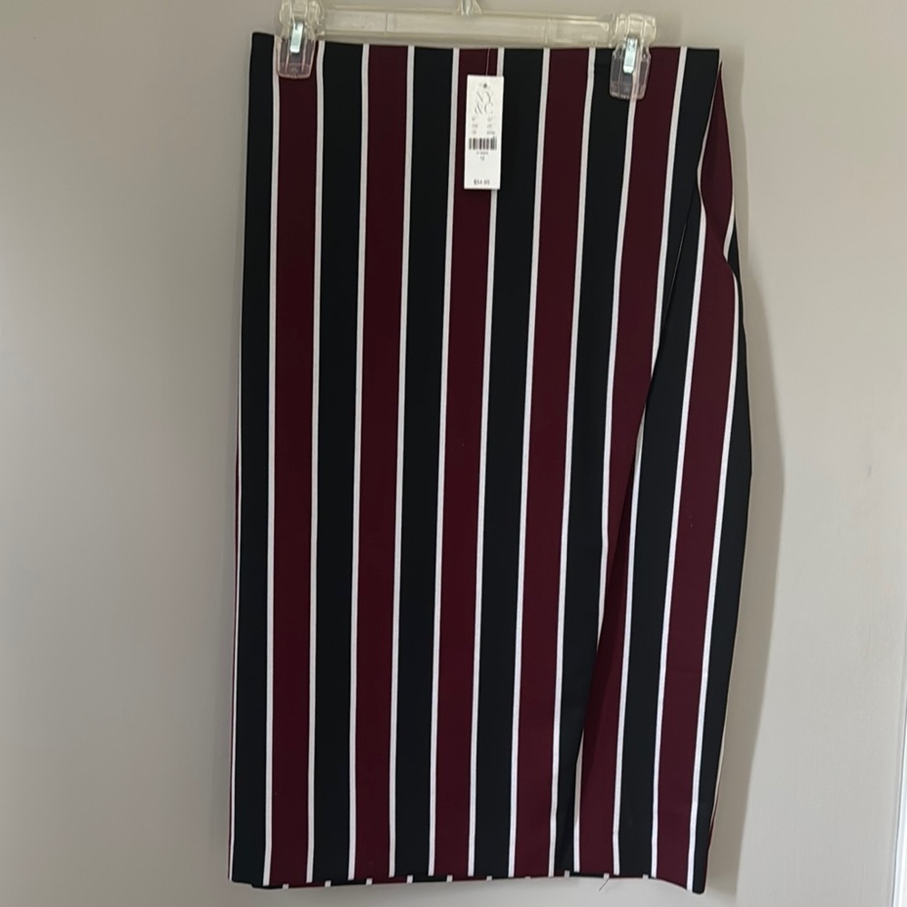 New York & Company Black and Burgundy Striped Midi Skirt. Has a faux wrap front.